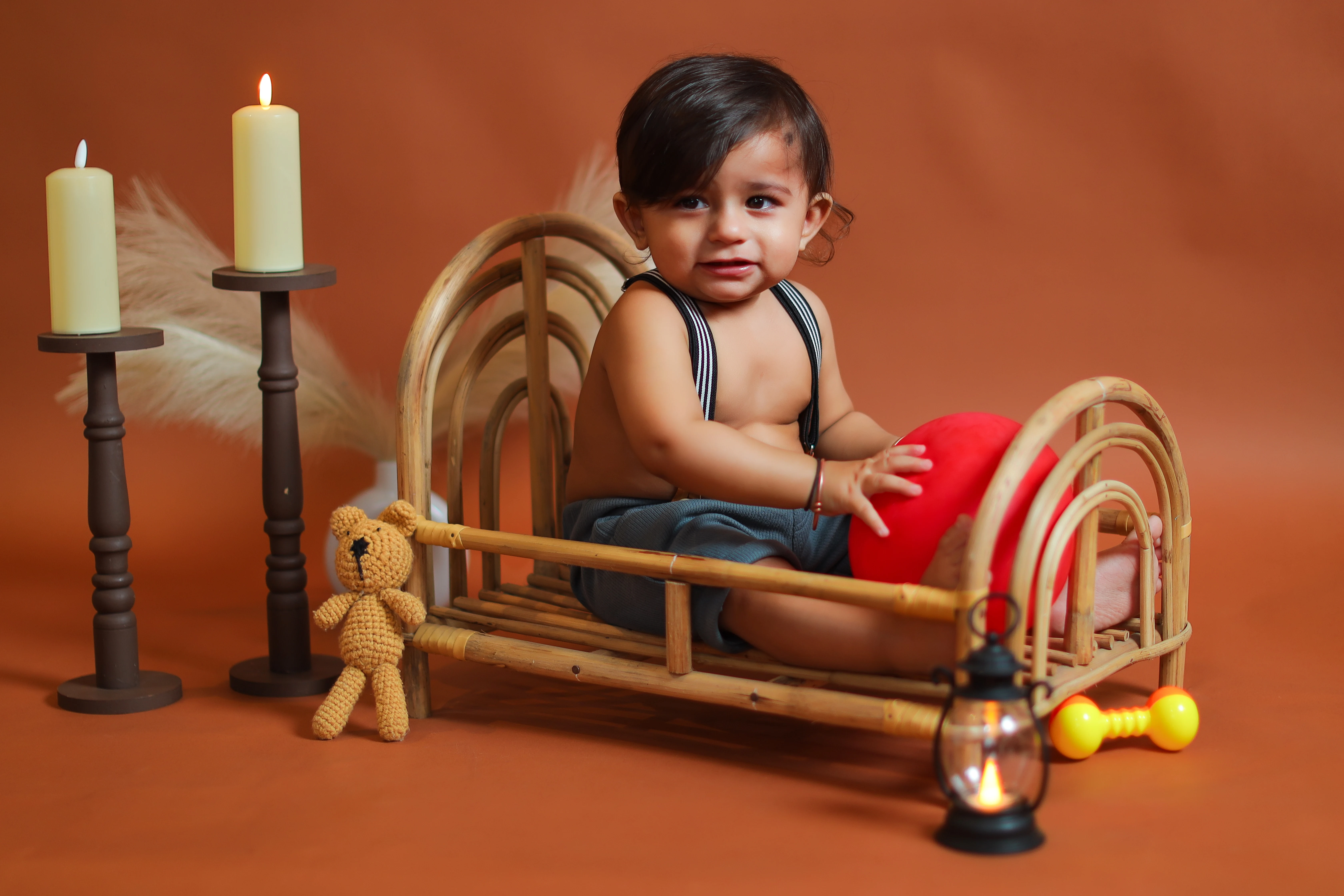 baby on woodeden bed